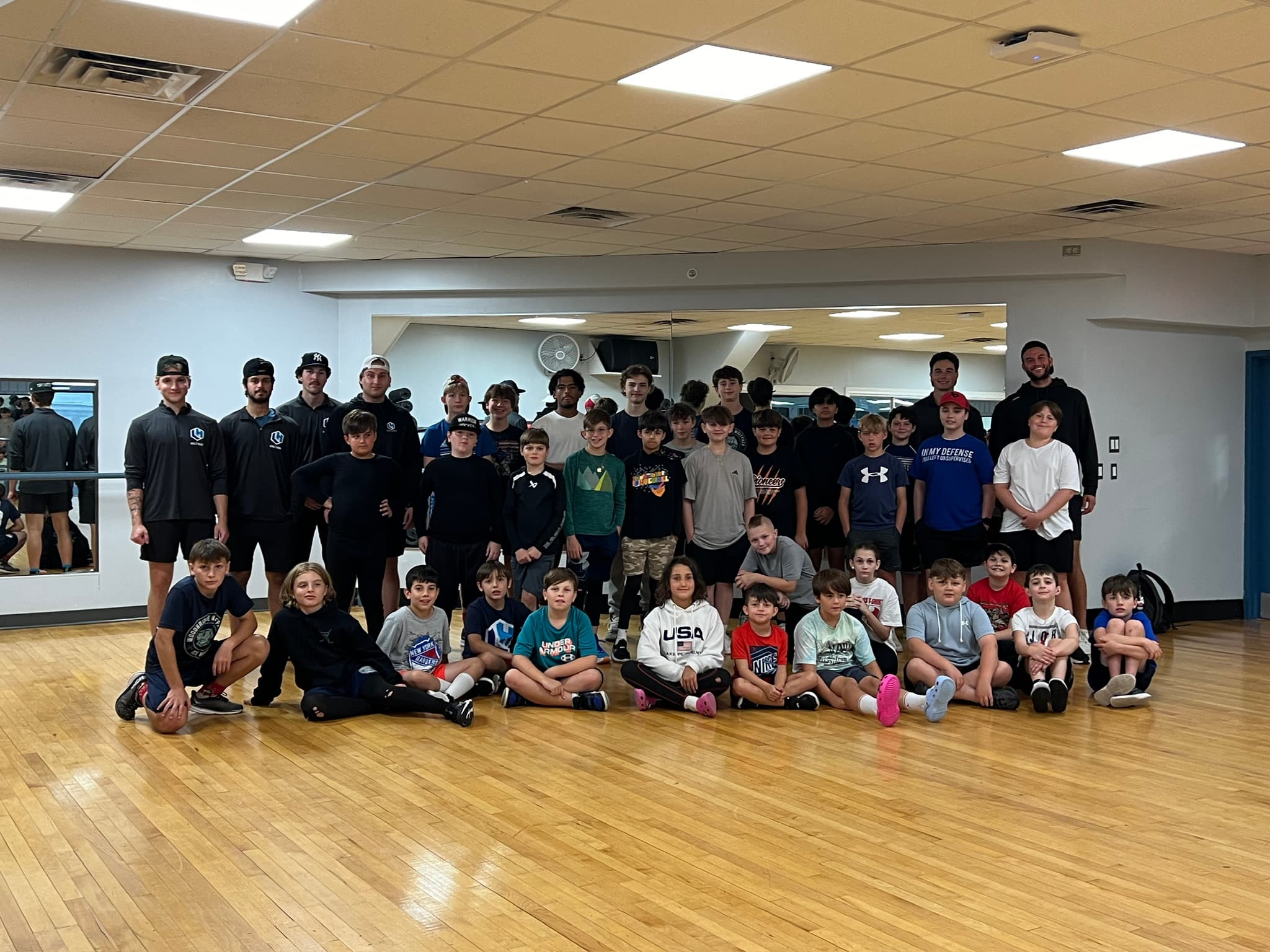 LH Goaltending camp huddle on ice