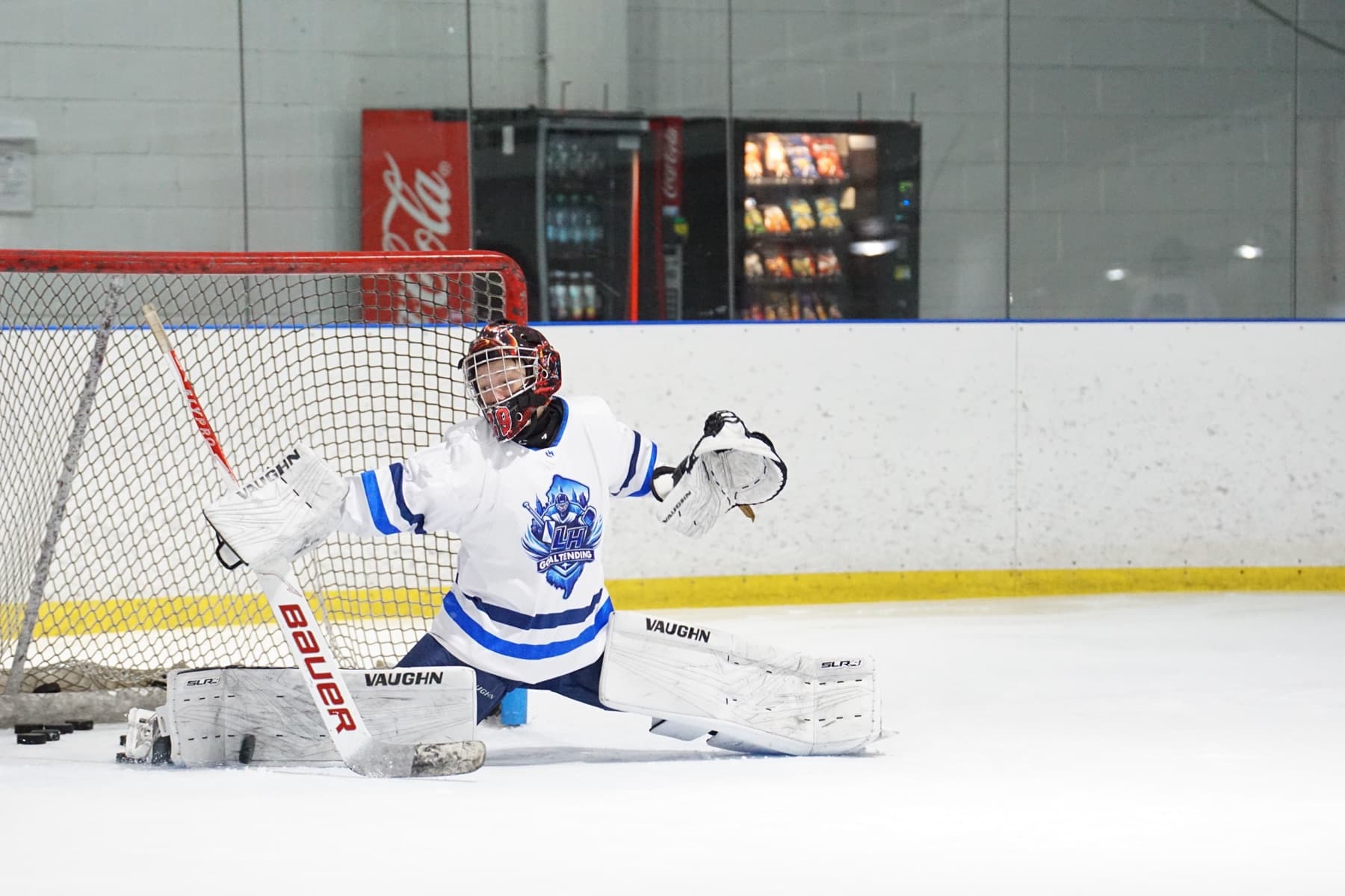 LH Goaltending goalie making a butterfly save